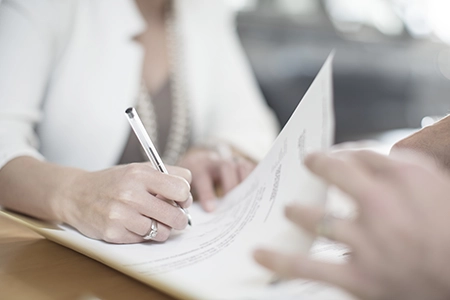 hand and banking paperwork